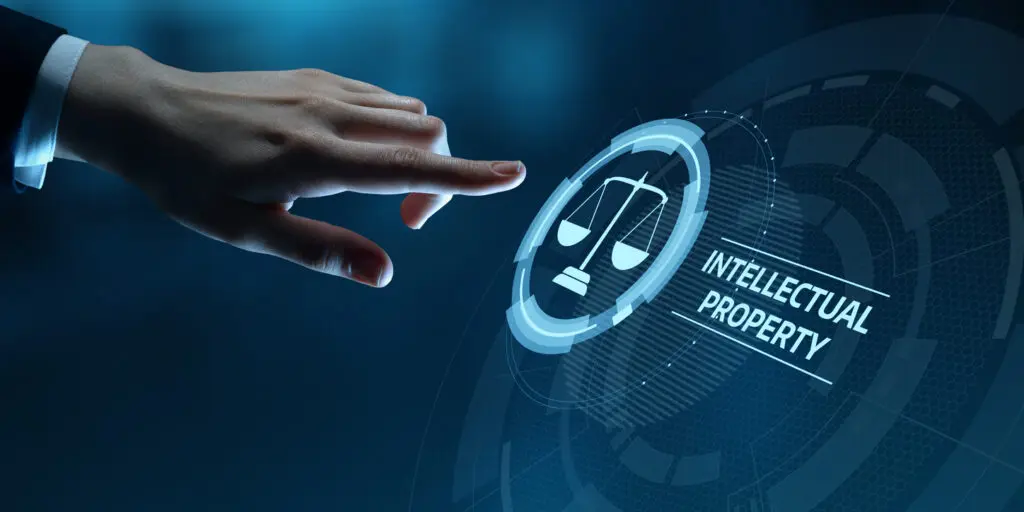 Legal Protection and Intellectual Property Concept:: Businessman touch digital icon