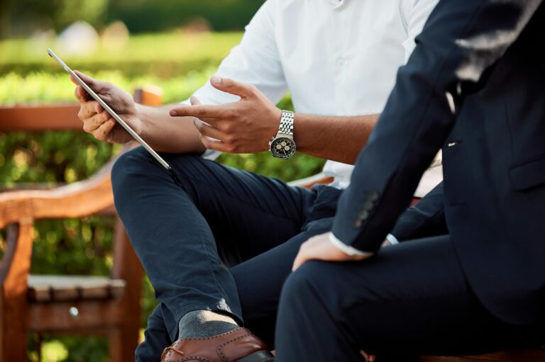 Two business professionals discussing a verbal agreement in California
